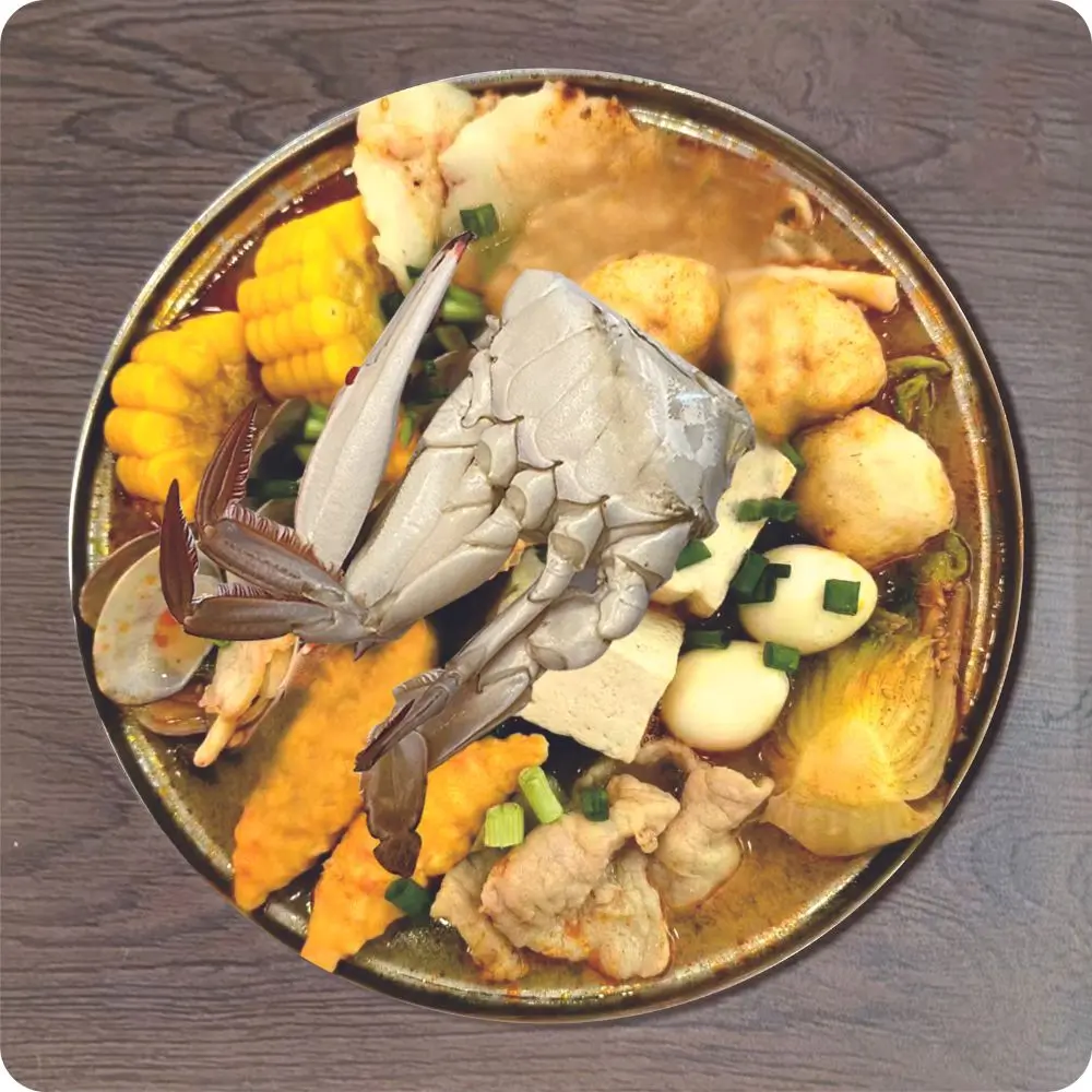 Chop-Asian-Kitchen-Chinese-Restaurant-Seafood-and-Pork-Hot-Pot-Santa-Rosa Hot pot with crab, pork, corn, tofu, and mixed ingredients at Chop Asian Kitchen, a Chinese restaurant in Santa Rosa